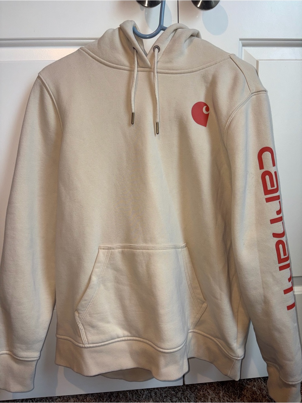 Carhartt Women’s Cream Hoodie with Orange Logo